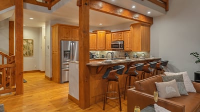 Fully-equipped kitchen with breakfast bar seating