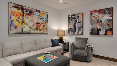 Family room with comfortable seating on the lower level