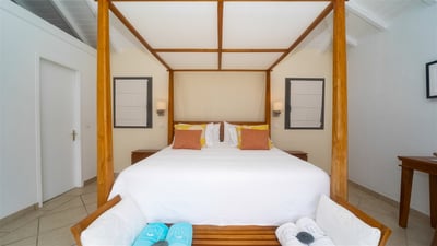 Bedroom 1: King size bed, air conditioning, dressing room, programmable safe. Adjoining bathroom wit