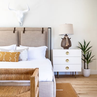 Primary bedroom with king bed, writing desk, TV and seating area. Direct access to the front pool.