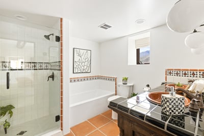 Stand up shower and tub.