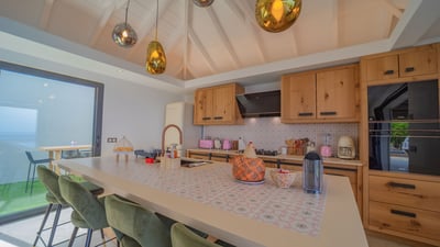 Kitchen & Dining Area: Fully equipped and air conditioned kitchen. Oven, microwave, gas hob, toaster