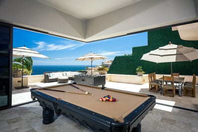Shoot some pool while still taking in a look at the waterfront.
