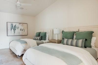 Guest bedroom 4 - 2 Queen beds, smart TV and direct access to the patio through the en suite bathroo