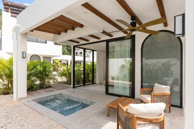 - Lounge just steps from your room in a private patio with comfy seating and a pool
- Enjoy a tranqu
