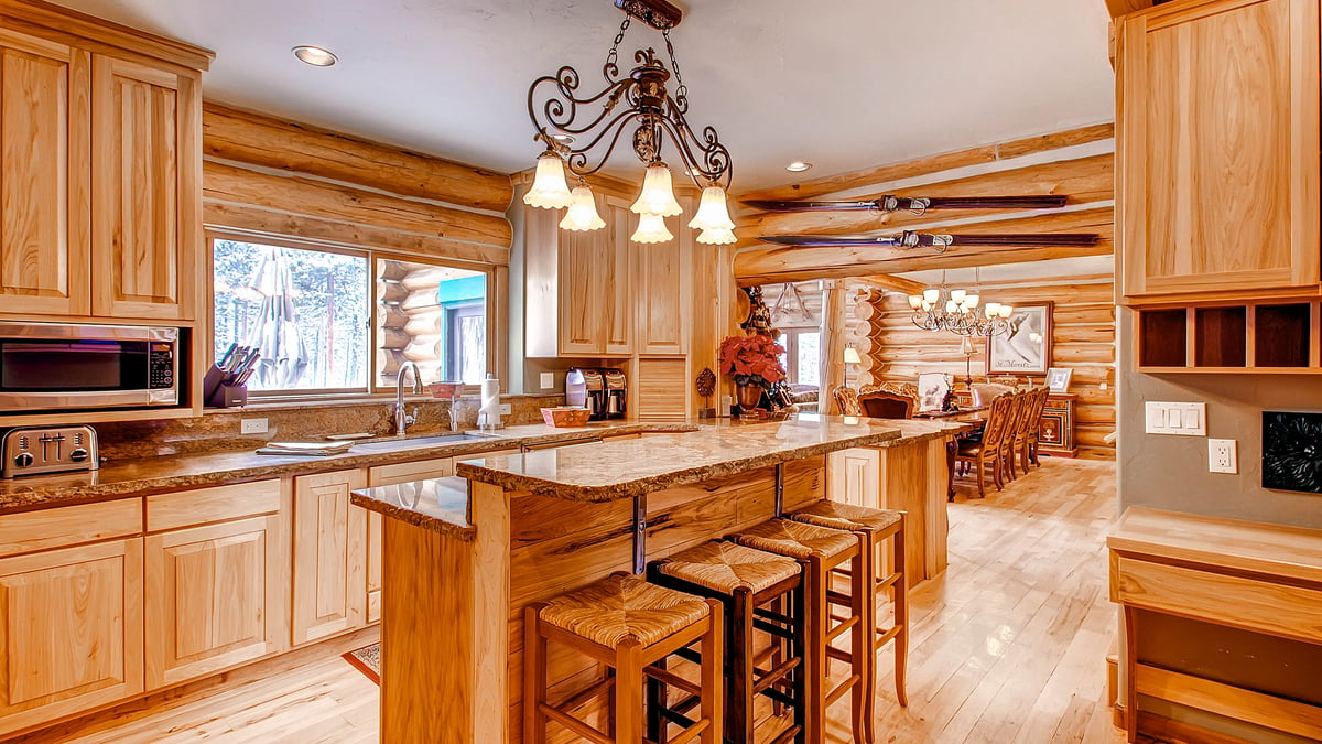 Kitchen with bar seating - Image 9