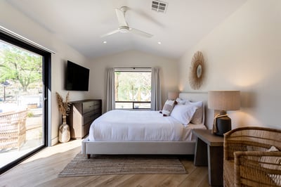 Guest bedroom 2 with sliding door to access backyard pool.