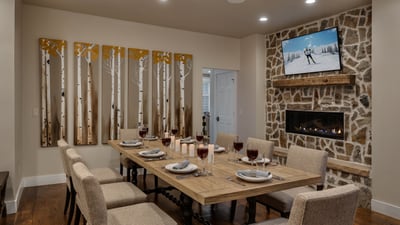 Dining area with fireplace and TV