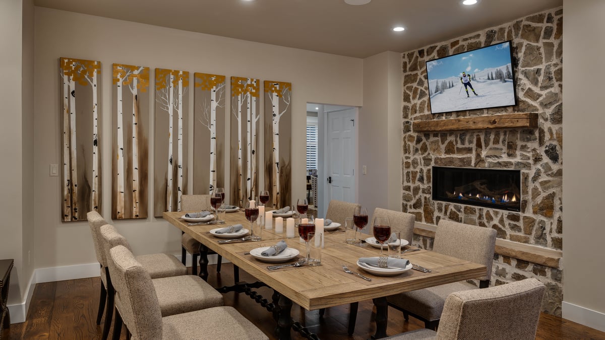 Dining area with fireplace and TV - Image 9