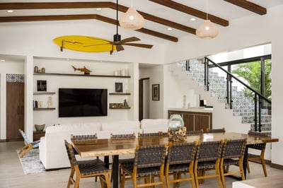 - Dine in style at a handcrafted table with woven chairs and wood accents
- Cozy up on the plush sec