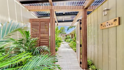 Outdoors: Beautiful garden surrounding the property. Panoramic views over the bay. Private parking a