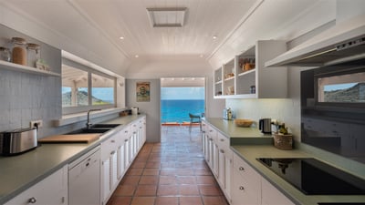 Kitchen & Dining Area: Fully equipped. Electric oven, gas stove, microwave, refrigerator, mixer, cen