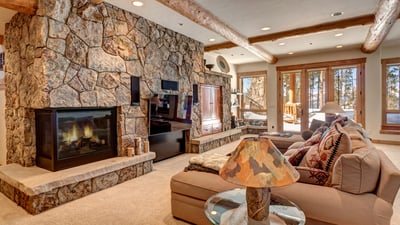 Family room on lower level with TV, patio