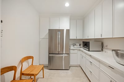 Additional full size fridge available in the pantry.