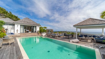 Pool & Terrace: One large pool on the main level with lounge area under an ajoupa. Deckchairs . Magn