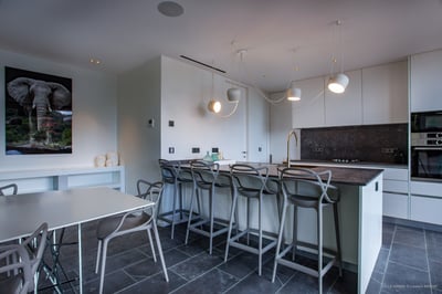 Kitchen & Dining Area: Located on the first floor. The elegant fully equipped kitchen, breakfast bar