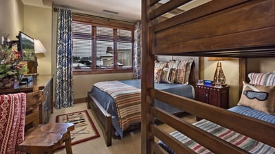 Family suite with queen bed and a full over full bunk