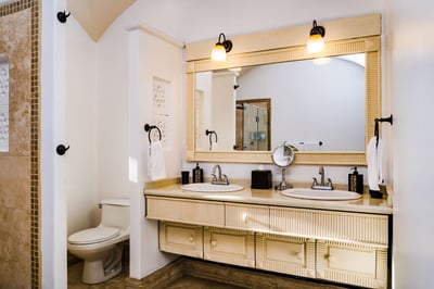 #1 Master suite – His and Hers double sink bathroom, each with its own side, and a spacious, modern 