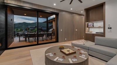 Sitting room on main level with deck access