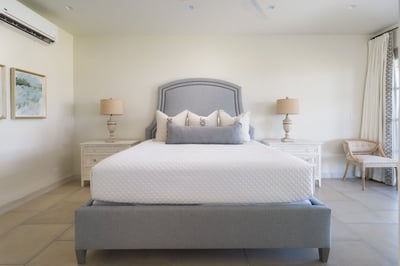 - Rest in a soft neutral toned space with natural textures and elegant detail
- Classic gray headboa