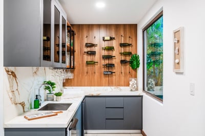 Shake up your favorite drinks with the built-in ice maker and wine fridge.