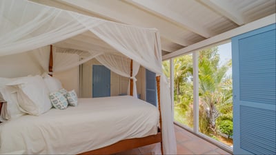 Bedroom 3: Located on a level above the main house, next to Bedroom 2. Queen size bed, air condition