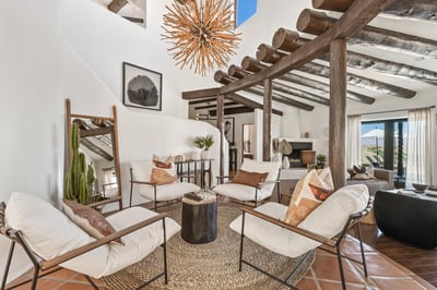 A bright and airy foyer with pops of color keeps this space alive!