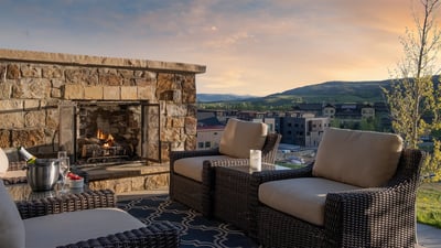 Enjoy the views from this cozy outdoor fieplace