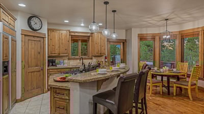 Main level kitchen with breakfast bar and breakfast nook