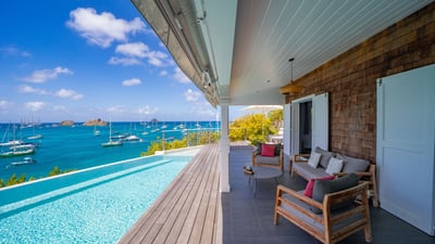 Outdoor Lounge Area: Nice lounge area on the covered terrace, outdoor dining table facing the view.&