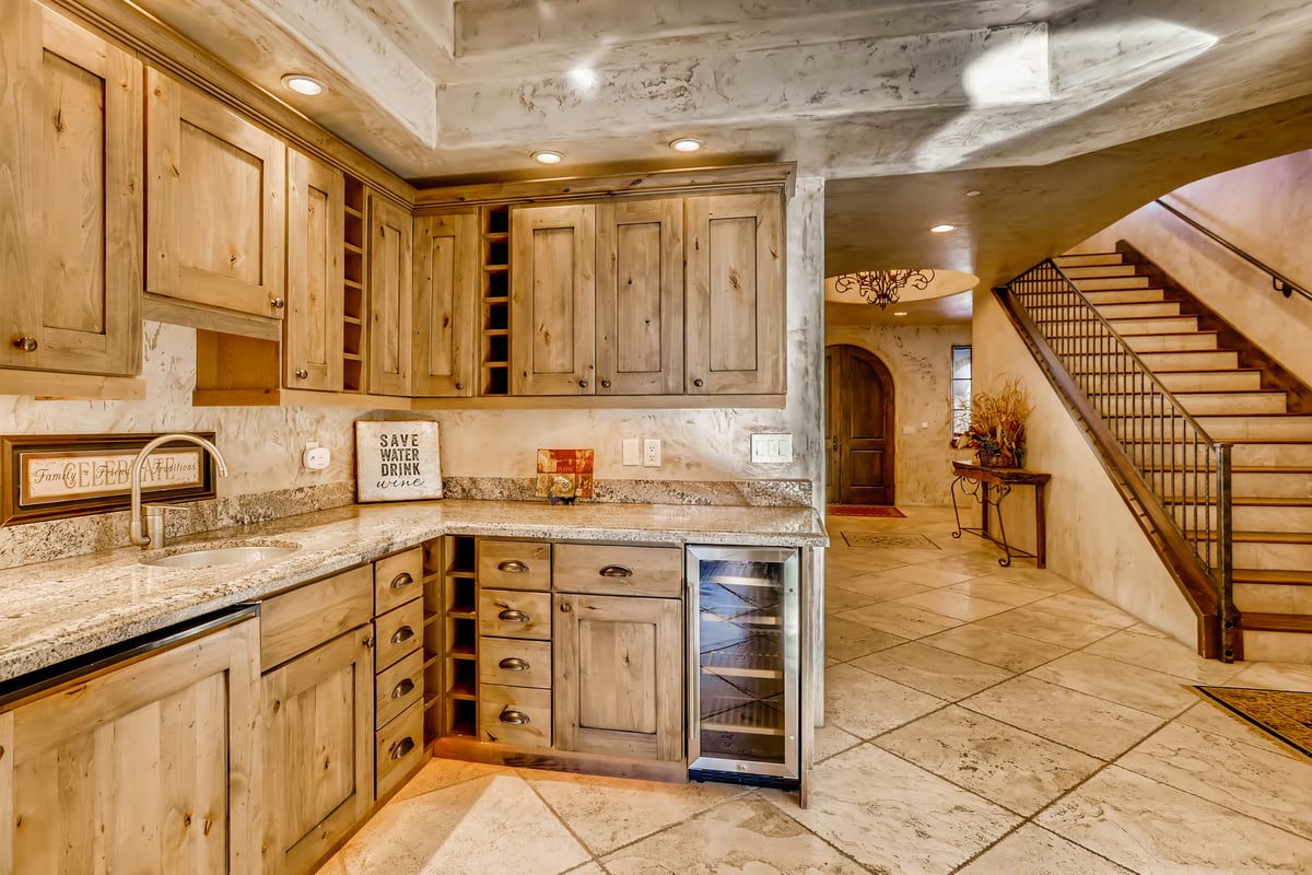 Wet bar outside of kitchen with wine fridge, leads to great room - Image 19